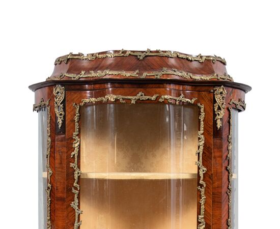Showcase veneered in various woods. France, late 19th century.