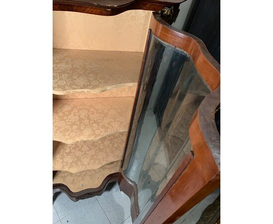 Showcase veneered in various woods. France, late 19th century.