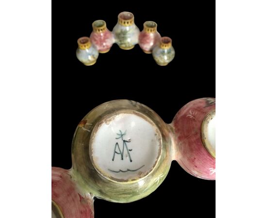 Centerpiece made up of two series of globular jars decorated with landscapes. Minghetti Bologna manufacture