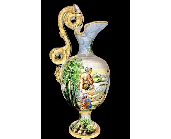 Majolica pouring vase with historical decoration. Minghetti, Bologna.