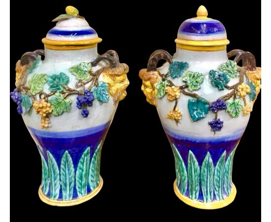 Pair of majolica vases with vine and plant motifs in relief. Imola manufacture.