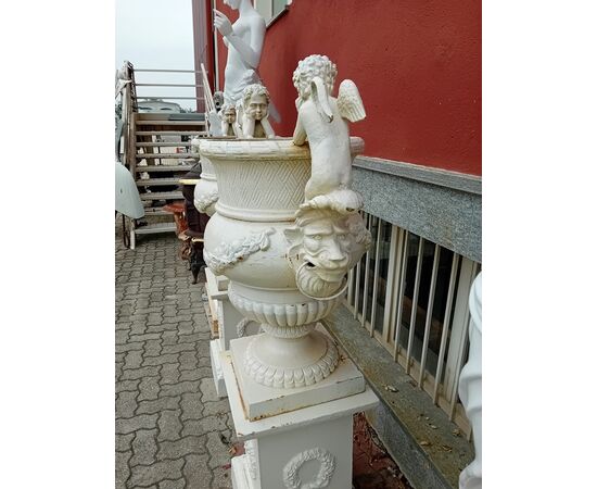 Pair of cast iron vases with Art Nouveau pedestal
