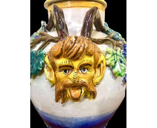 Pair of majolica vases with vine and plant motifs in relief. Imola manufacture.