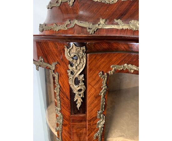 Showcase veneered in various woods. France, late 19th century.