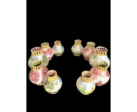 Centerpiece made up of two series of globular jars decorated with landscapes. Minghetti Bologna manufacture