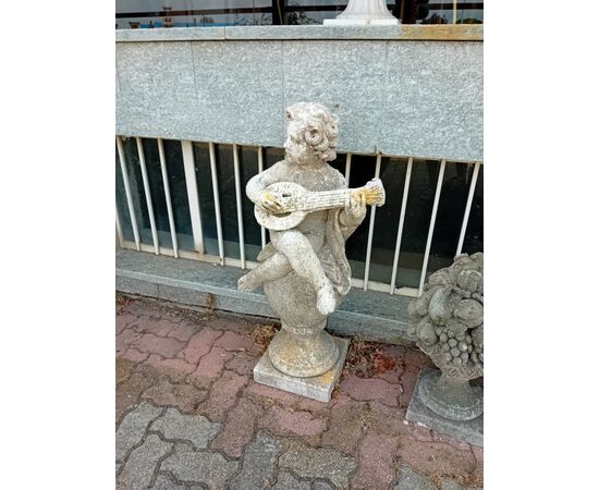 Putto with lute on sphere