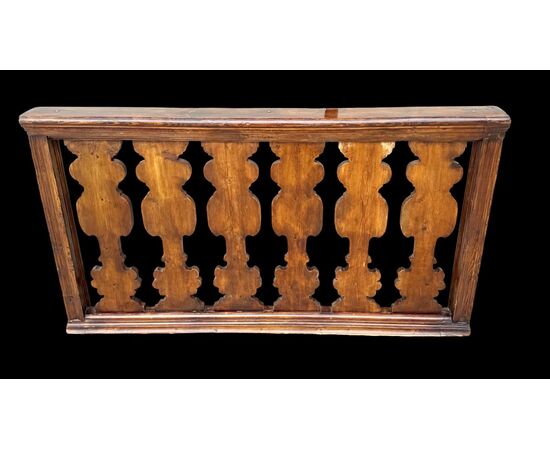 Solid wood balustrade railing.