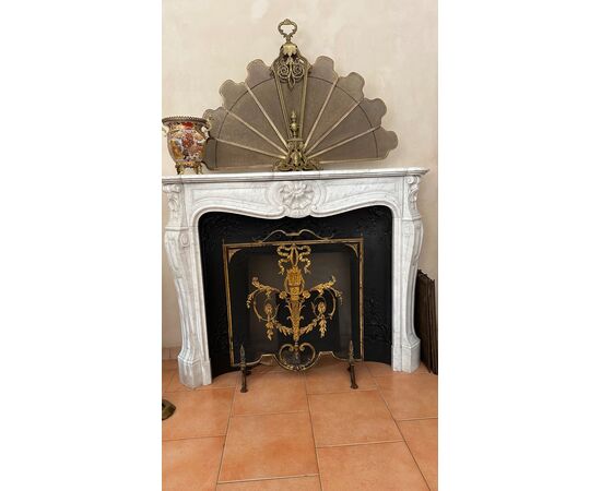 Three-shell fireplace with cast iron reducer and spark arrester proposals