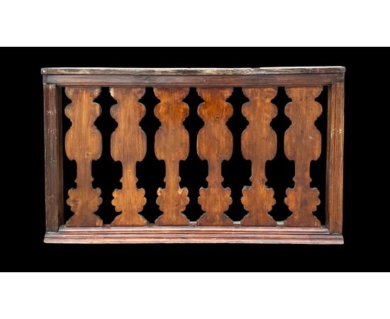 Solid wood balustrade railing.