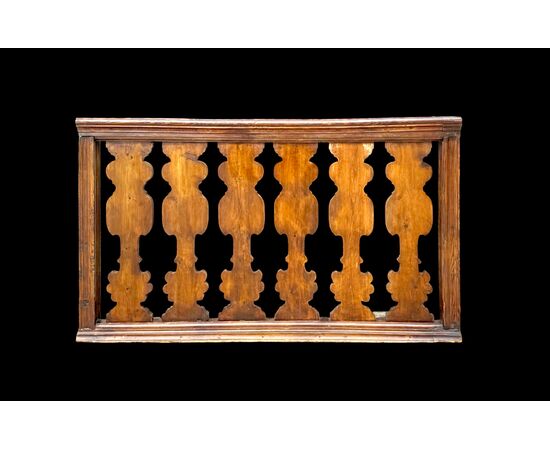 Solid wood balustrade railing.