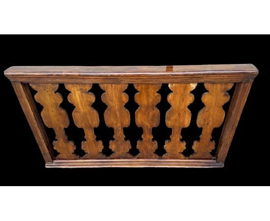 Solid wood balustrade railing.