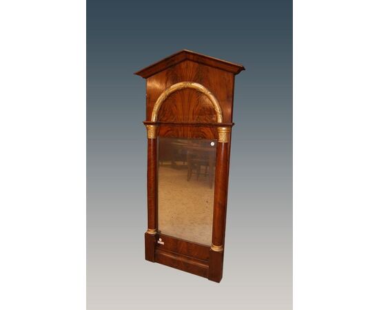 Antique North European Biedermeier style mirror from the first half of the 19th century with bronzes