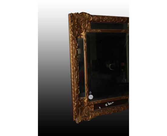 Graceful French mirror from the 1800s, Louis XVI style, gold leaf gilded.