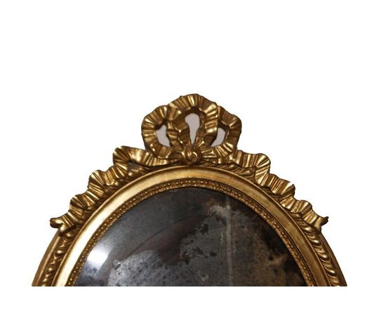 Antique Louis XVI oval mirror from the 1800s