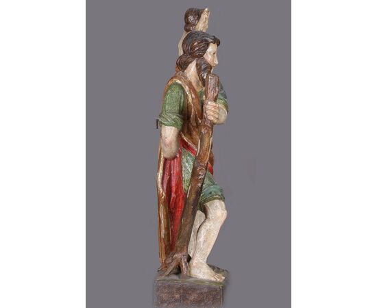 Antique wooden statue depicting Saint Christopher with Child