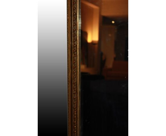 Large Louis XVI style gilded rectangular symmetrical mirror, 20th century