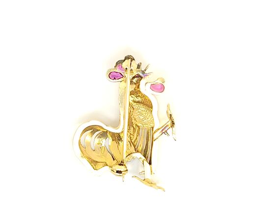 Spilla in oro con rubini e diamanti