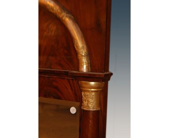 Antique North European Biedermeier style mirror from the first half of the 19th century with bronzes