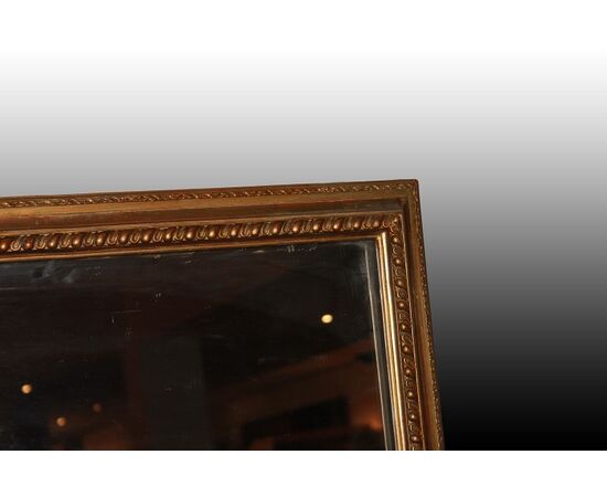 Large Louis XVI style gilded rectangular symmetrical mirror, 20th century