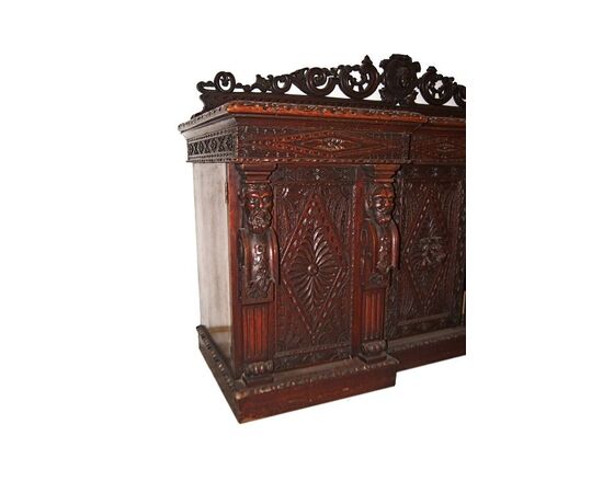 Antique large Tudor style sideboard from the 1800s in oak with a Glasgow Cathedral plate
