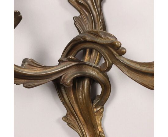 Group of five two-light bronze sconces. 19th century
