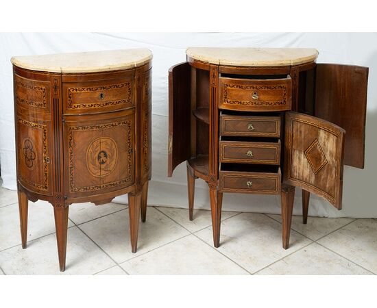 Pair of antique Louis XVI Neapolitan demi-lune sideboards belonging to the second half of the 18th century.