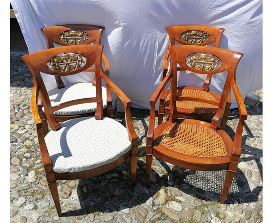 Four carved wooden armchairs. Italy, mid-19th century.