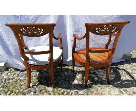 Four carved wooden armchairs. Italy, mid-19th century.