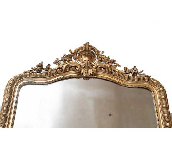 Antique French Napoleon III mirror in gilded and carved wood. 19th century period.