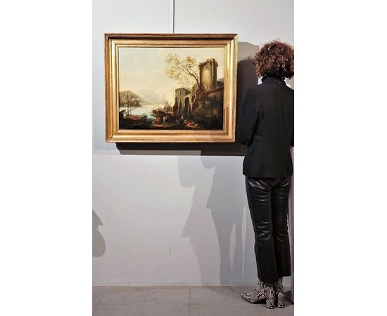 Paesaggio costiero con porto e rovine
