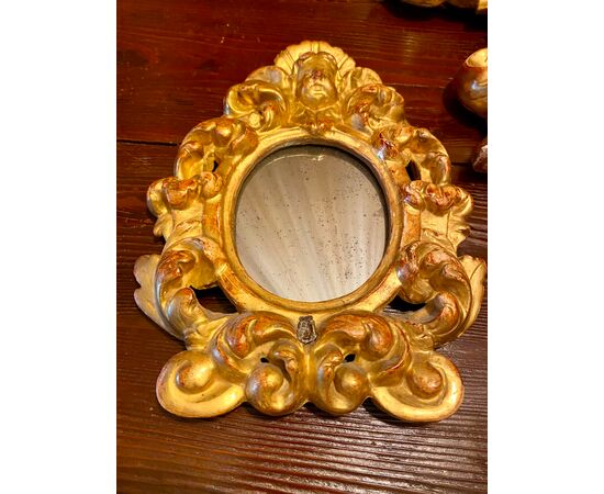 Cartaglorie in legno scolpito e dorato