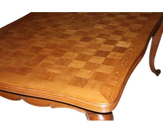 Early 20th century extendable Provençal walnut table with parquet top