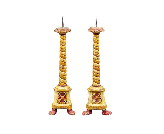 Pair of lacquered and painted wooden candlesticks. Venice, 18th/19th century.