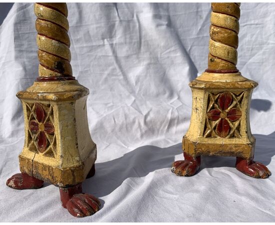 Pair of lacquered and painted wooden candlesticks. Venice, 18th/19th century.