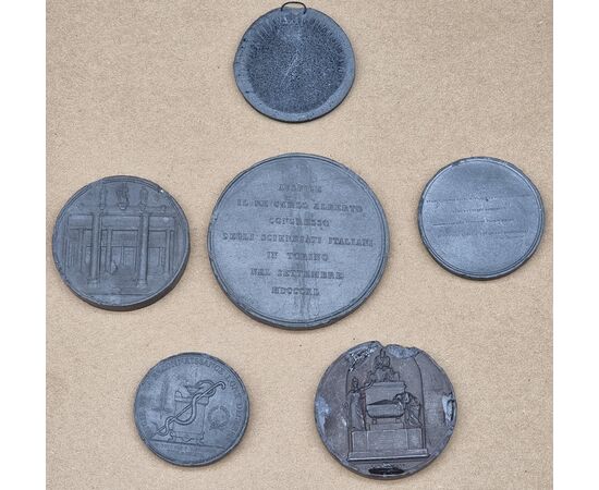 Nucleo di sei medaglie commemorative in pasta vulcanica o materiale simile, XIX secolo