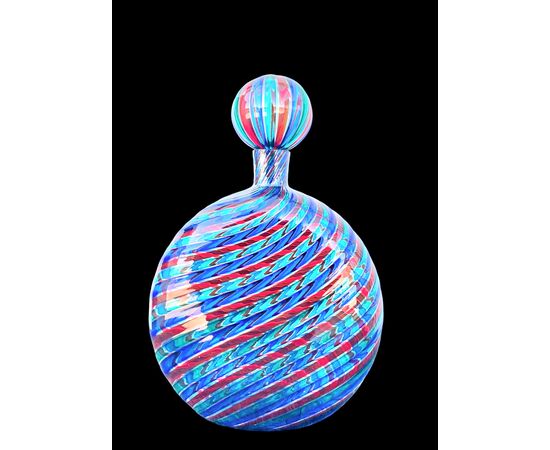 Round blown glass bottle with multicolored spiral bands. Ve.Art.Murano.