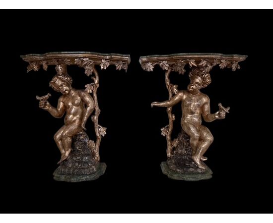 Pair of lacquered and gilded consoles