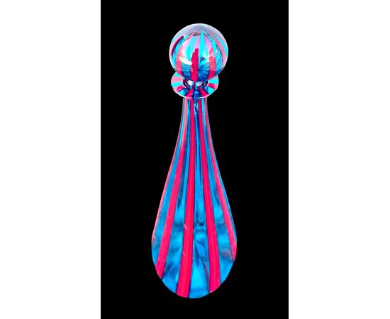 Glass bottle with red and blue vertical stripes. Ve.Art, Murano.