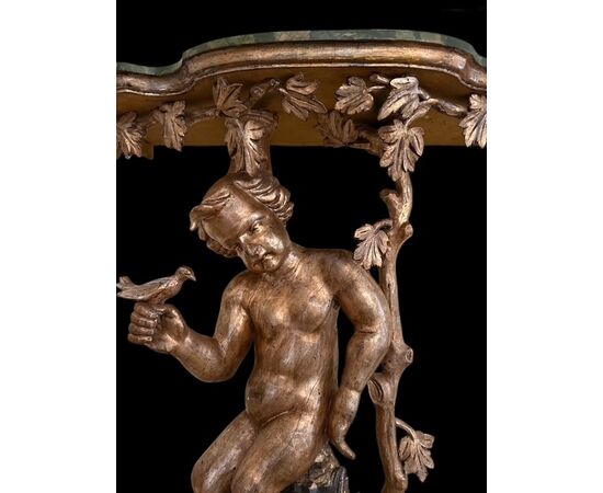 Pair of lacquered and gilded consoles