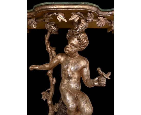 Pair of lacquered and gilded consoles