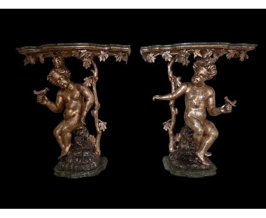 Pair of lacquered and gilded consoles