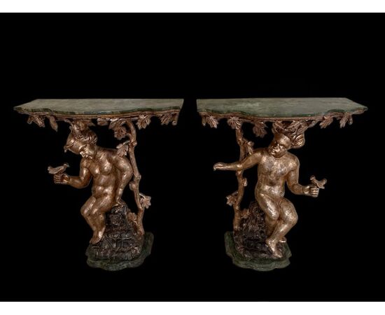 Pair of lacquered and gilded consoles