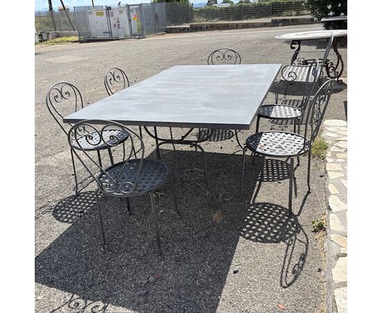 Large handmade wrought iron outdoor table with six chairs. Dimensions: 182 x 112 cm