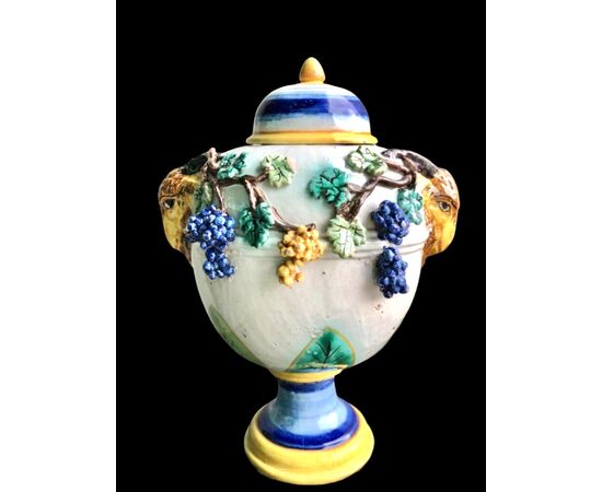 Pair of majolica vases with raised grape vine decoration and leaf motif. Rubbiani manufacture, Sassuolo.