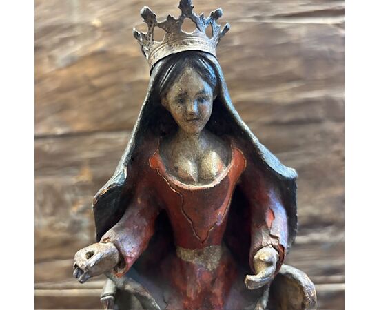 Antique sculpture of the Madonna on the throne. Polychrome painted, 17th century, h 35