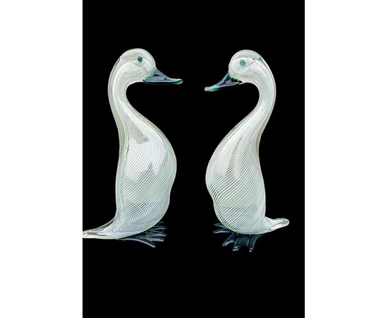 Pair of heavy glass ducks with lattimo filigree inclusions. Murano.