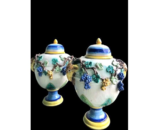 Pair of majolica vases with raised grape vine decoration and leaf motif. Rubbiani manufacture, Sassuolo.
