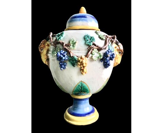 Pair of majolica vases with raised grape vine decoration and leaf motif. Rubbiani manufacture, Sassuolo.