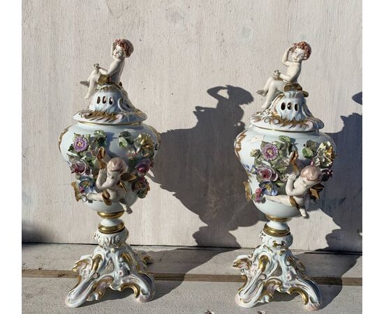 Pair of polychrome porcelain incense burner vases. Capodimonte, 19th century.