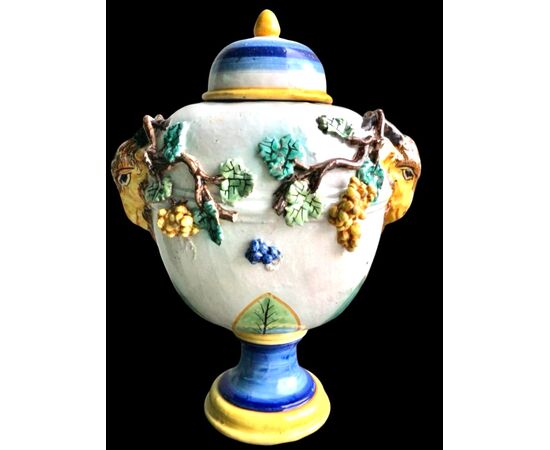 Pair of majolica vases with raised grape vine decoration and leaf motif. Rubbiani manufacture, Sassuolo.